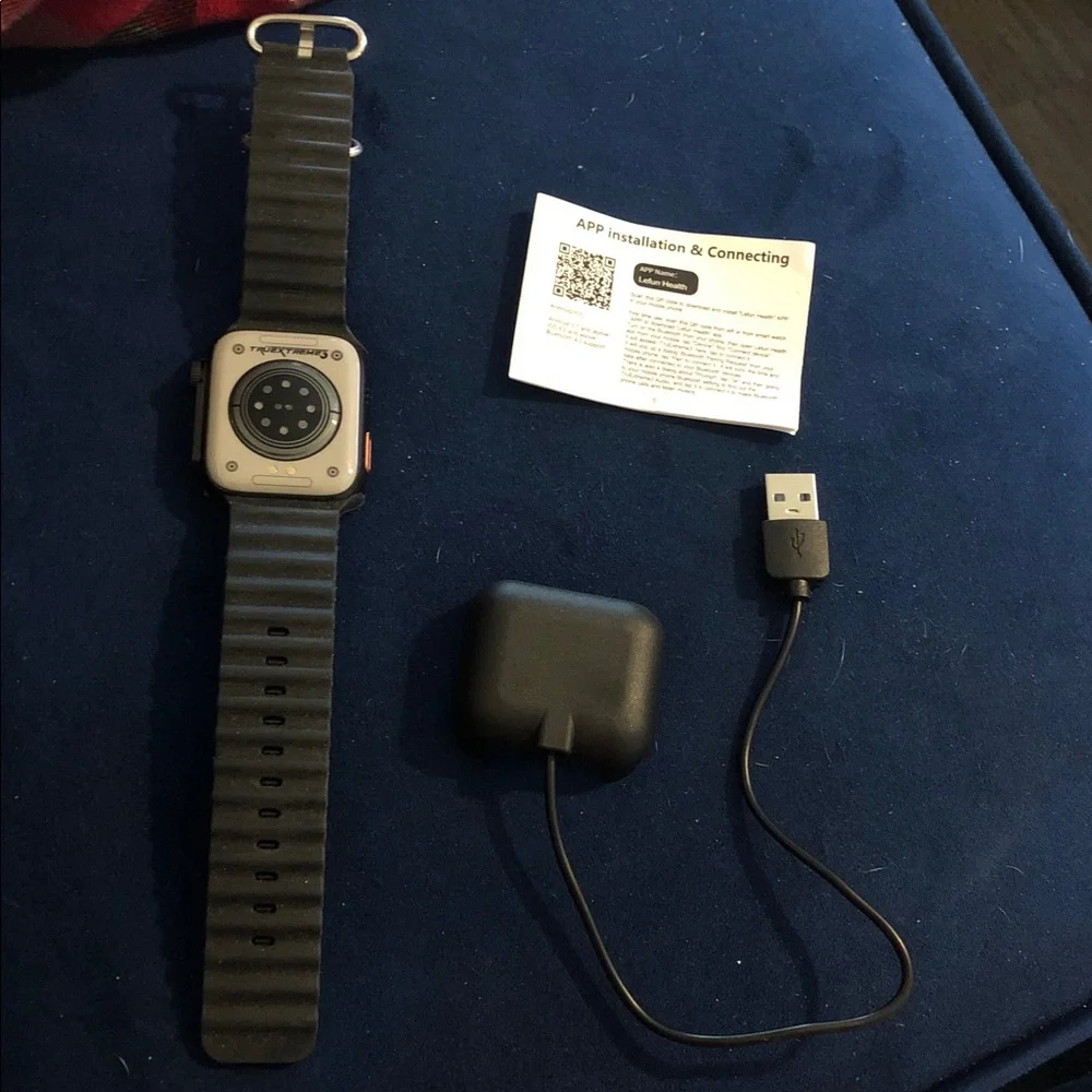 Black Smartwatch with USB Charging Cable